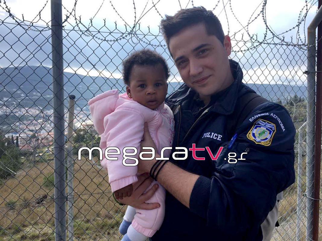 greekpoliceman_refugee